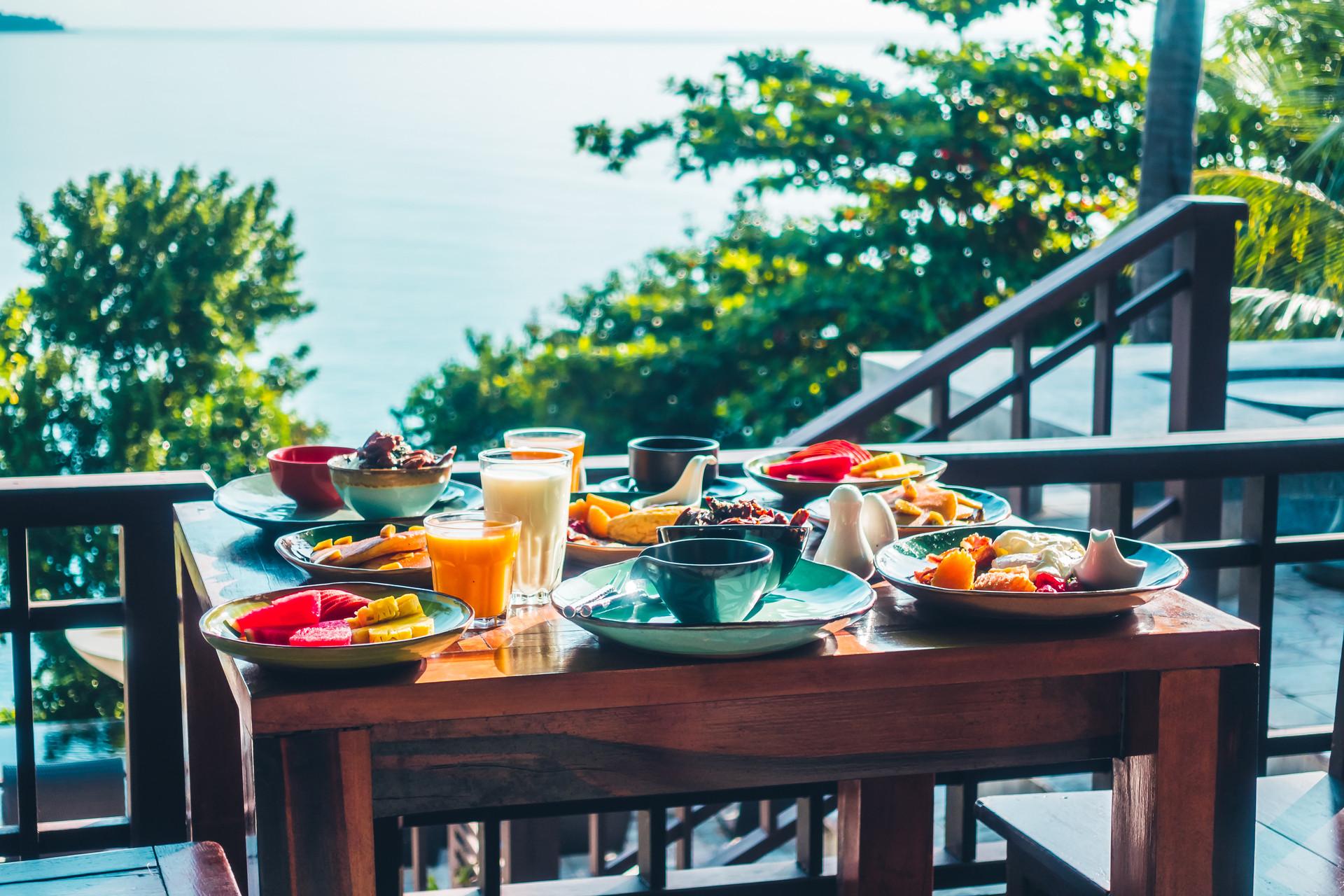 healthy breakfast set with egg bacon pancakes orange juice milk bread coffee (1).jpg